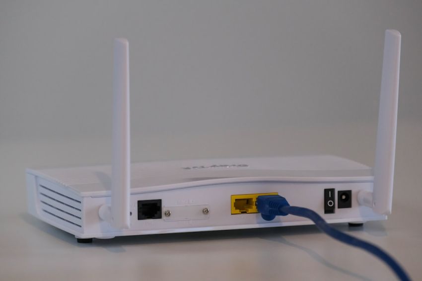 Internet Router - white router on white table