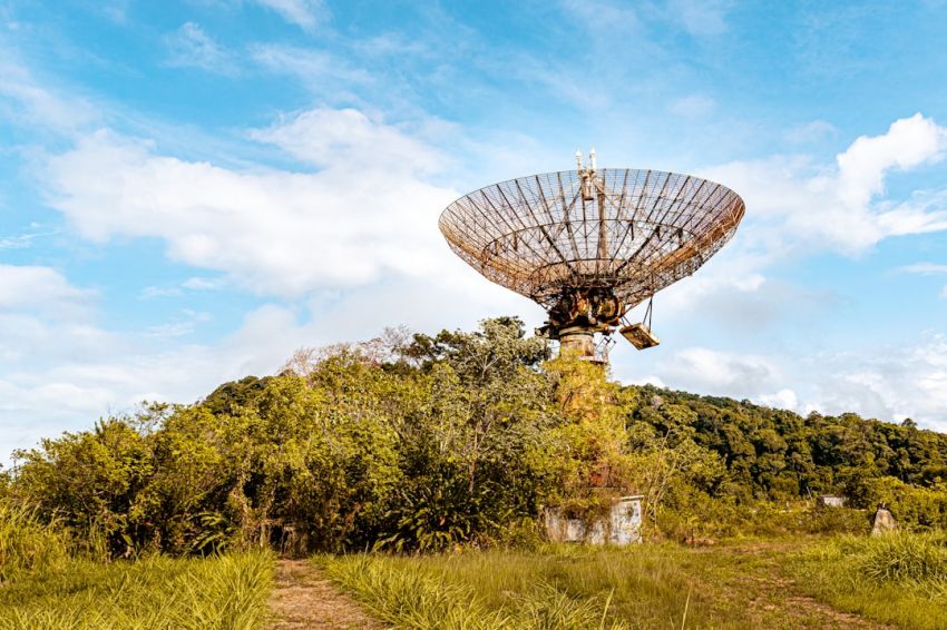 Satellite Antenna - green trees on hill under blue sky during daytime