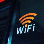 Wi-Fi - a close up of the wifi logo on the side of a bus